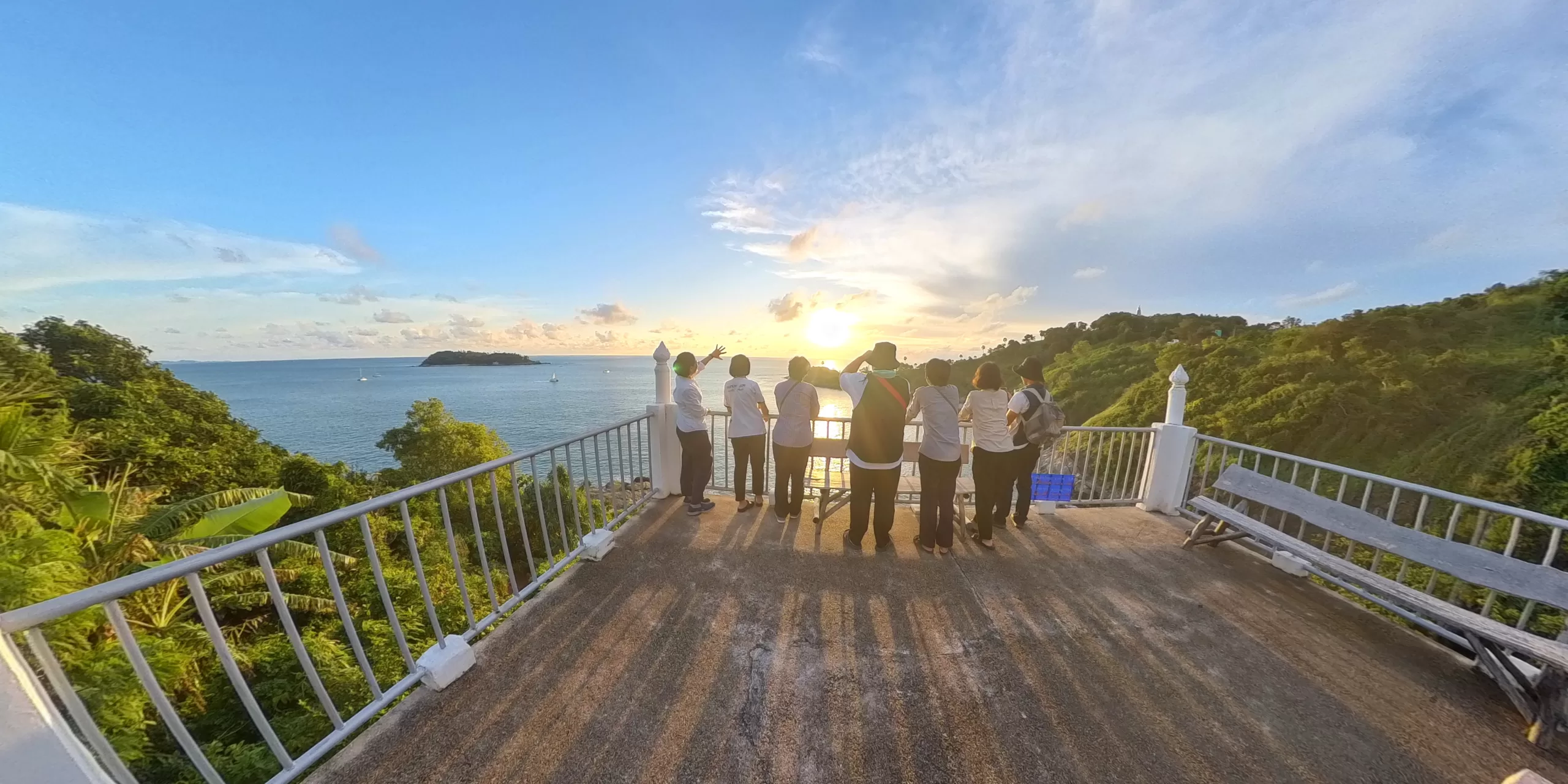 Visitors enjoying golden hour at Promthep Cape, Phuket’s legendary sunset viewpoint