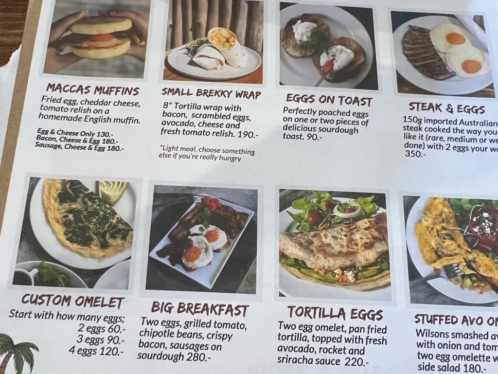 Breakfast menu at Wilson’s Cafe Phuket Town featuring eggs, wraps, and steak and eggs